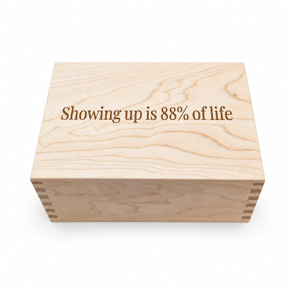 Handcrafted wooden box with laser engraved text showing up is 88% of life