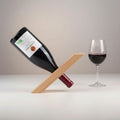 Handmade wooden balancing wine bottle holder