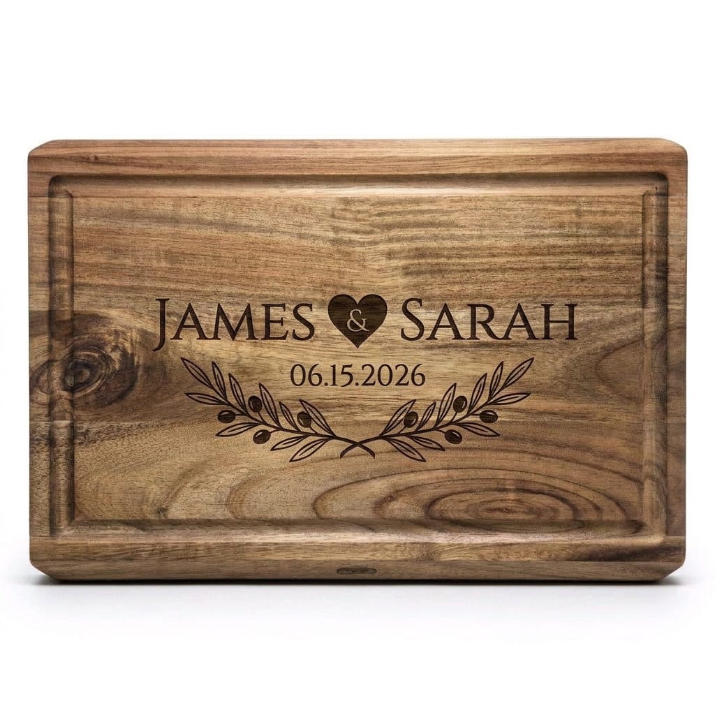 Custom acacia cutting board engraved with James & Sarah names, heart and wedding date